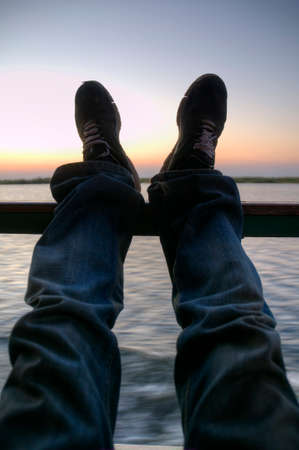 A pair of man's shoes resting in Chobe National Park, Botswana, Africa