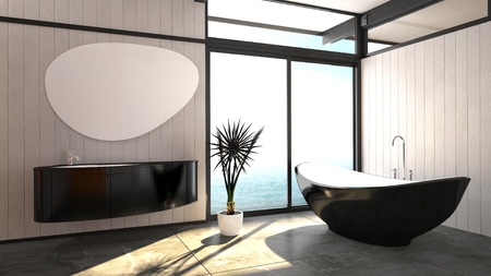 Modern elegant boat-shaped black bathtub standing in a bright airy bathroom with a floor-to-ceiling window and wall-mounted vanity unit with a trendy mirrorのeditorial素材