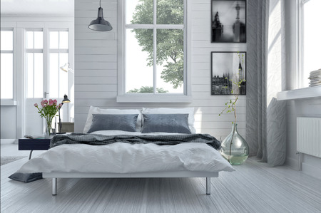 Double divan bed in a light spacious upmarket modern bedroom with large windows and artwork on the...
