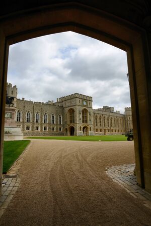 View through an archway of the Upper Ward and entrance to the official State Apartments, Windsor Castle, Berkshire, UKのeditorial素材