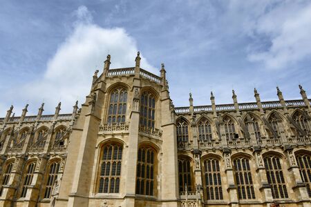 Ornate Gothic 15th century facade of St Georges Chapel in Windsor Castle, UK, the official residence of the Queen and famous tourist attractionのeditorial素材