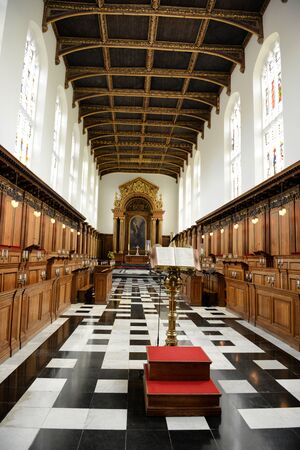 Interior of Trinity College Chapel Looking Towards Baldacchino Altar with Golden Eagle Lectern in Foreground and Stalls Along Side, Cambridge University, Englandのeditorial素材