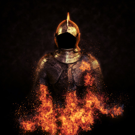 Ancient suit of armour consumed by fire with fiery orange flames licking around the bottom illuminating it in an eerie glow in the darkness, square format artistic imageの写真素材