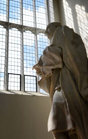 Statue of Isaac Newton, Designed by Louis-Francois Roubiliac in 1775, Inside Trinity College Chapel at University of Cambridge, Englandのeditorial素材