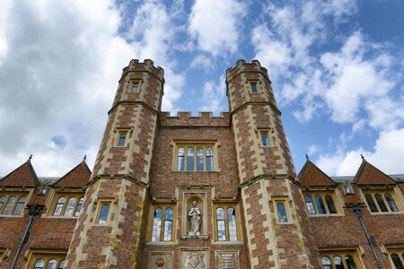 Low Angle View of Tower of Second Court, an Example of Tudor Architecture, Leading to Third Court, St Johns College Campus, University of Cambridge, England, with Blue Sky and Cloudsのeditorial素材