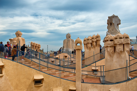 BARCELONA, SPAIN - MAY 01. Gaudi Chimneys at Casa Mila (also known as La Pedrera) on May 1, 2015 in Barcelona. Terrace of the Casa Mila, with chimneys shaped anthropomorphic soldiers, created by Gaudiのeditorial素材