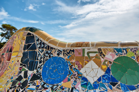 BARCELONA, SPAIN - MAY 02: GaudÃ­'s mosaic work on the main terrace at Parc Guell. Park GÃ¼ell is a public park system composed of gardens and architectonic elements. Barcelona, Spain, May 02 2015のeditorial素材