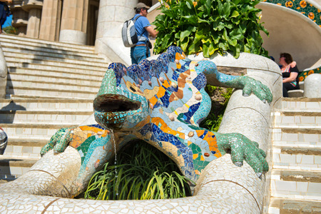 BARCELONA, SPAIN - MAY 02: GaudÃ­'s multicolored mosaic salamander, popularly known as "el drac" (the dragon) at Parc Guell in Barcelona, Spain on May 02, 2015のeditorial素材