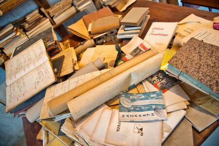 Antique Old Aged Books stacked on a wooden surfaceのeditorial素材
