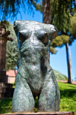 Torso statue of a naked female with a close up frontal view of her bare breasts in Poble Espanyol, Barcelona, Spainのeditorial素材