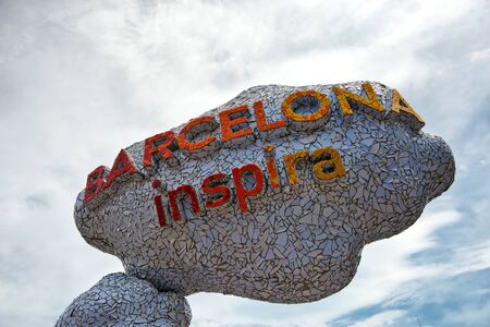 Low Angle View of Barcelona Inspira Slogan on Cloud Shaped Art Installation Piece in Barcelona, Spainのeditorial素材