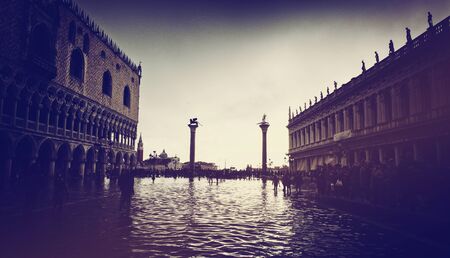 VENICE, ITALY - 17 OCTOBER 2015: St. Marks Square (Piazza San Marco) during high tide (acqua alta)...