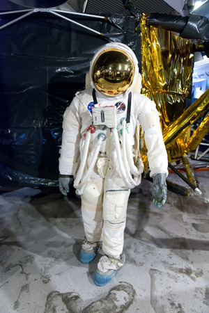Front view of exhibit of full size astronaut walking on the moon in front of large reproduction of the lunar landerのeditorial素材