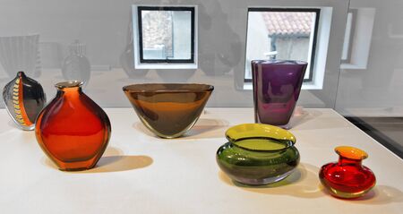 Display of colorful Murano glass manufactured on the island of Murano, Venice, Italy to the same...