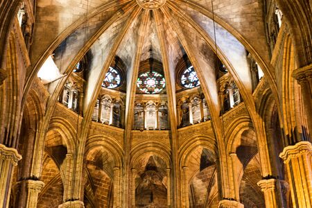 Architectural Detail of Apse in Interior of Barcelona Cathedral with Round Stained Glass Windows, Barcelona, Spainのeditorial素材
