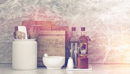 Toned artistic image with sun flare of assorted kitchen utensils for gourmet cooking with a pestle and mortar, olive oil , cutting boards and condiments on a counter. 3d Rendering.の写真素材