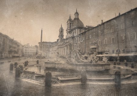 Aged vintage image of the Neptune Fountain, Rome and the Piazza Navona with staining and discoloration for retro travel themesのeditorial素材