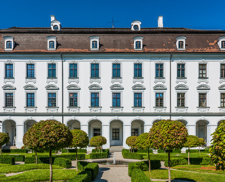 Augsburg, Germany - September 08, 2016: Baroque facade of the Schaezlerpalais , Augsburg, Bavaria, Germany with its formal gardens and topiary on a sunny blue sky day.のeditorial素材