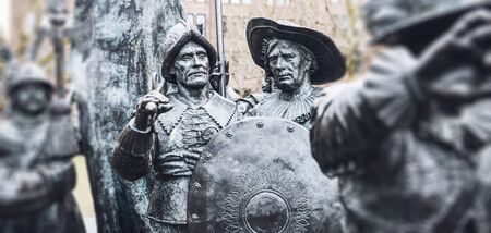 Two statues from the group of Russian bronzes detailing Night Watch based on the painting by Rembrandt in Amsterdam, Netherlandsのeditorial素材