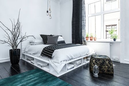 Neat modern bedroom interior with grey and white decor and a stylish bed with storage space below on...