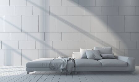 Generic couch with cushions in a monochromatic white room with wooden floor and tiled wall lit by...