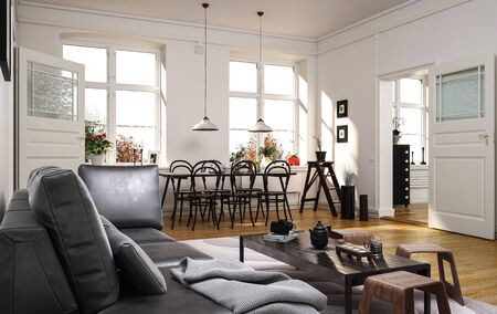 Spacious modern open plan living room with comfortable grey sofa and a dining area with small table...