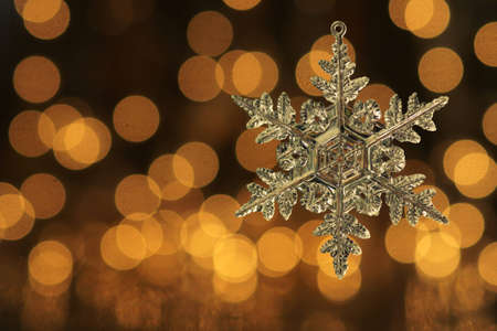Snowflake with Gold Lightsの写真素材