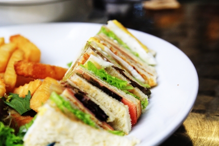 sandwiches with ham , vegetable and french friesの写真素材