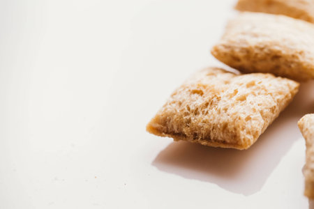 cereal pillows with chocolate filling on white background.