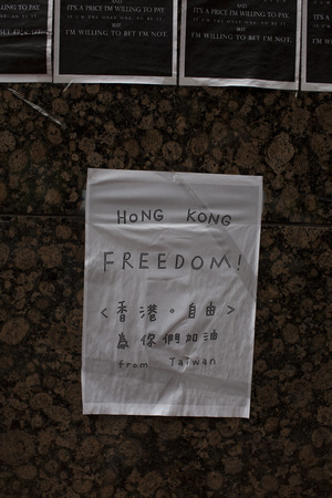 Pro democracy protestors have blocked off streets in Hong Kong's Central business district since September  28, 2014. They are demanding Beijing allow fair elections for Hong Kong's Chief Executive in 2017.のeditorial素材