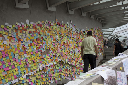 Pro democracy protestors have blocked off streets in Hong Kong's Central business district since September  28, 2014. They are demanding Beijing allow fair elections for Hong Kong's Chief Executive in 2017.のeditorial素材