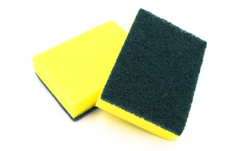 Green scourer isolate on white background.A tool used to scour, usually used to clean cookware. A scourer may be in the form of a mesh of wiresor a pad with a soft sponge-like side.の写真素材