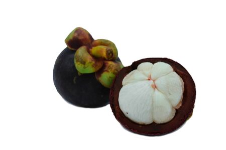 Mangosteen is an exotic, tropical fruit with a slightly sweet and sour flavor. It's originally from Southeast Asia but can be found in various tropical regions around the world.の写真素材