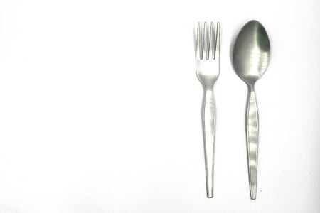 Spoon and rehearsal isolate on white background.の写真素材