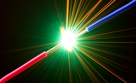 bright flash of short-circuit and flying sparks	の写真素材