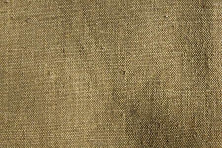 A blank grungy canvas texture. Great for backgrounds.の写真素材