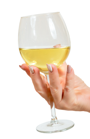 A glass of wine in his handの写真素材
