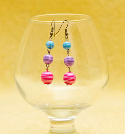earrings made from balls and small figuresの写真素材