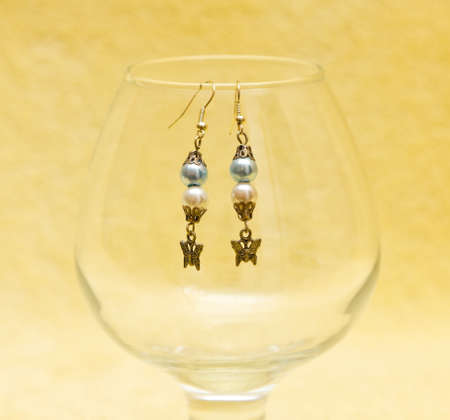 earrings made from balls and small figuresの写真素材