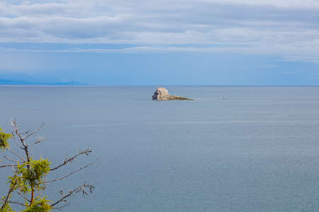Lake Baikal in cloudy weather. The rocks.の写真素材