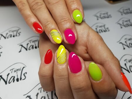 Beautiful colorful nails and hand manicure.のeditorial素材
