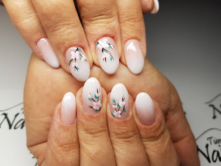 Beautiful colorful nails and hand manicure.のeditorial素材