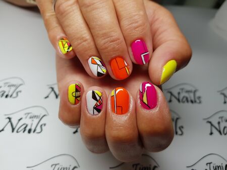 Beautiful colorful nails and hand manicure.のeditorial素材