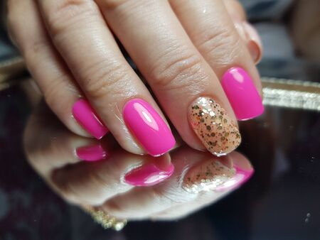 Beautiful colorful nails and hand manicure.のeditorial素材