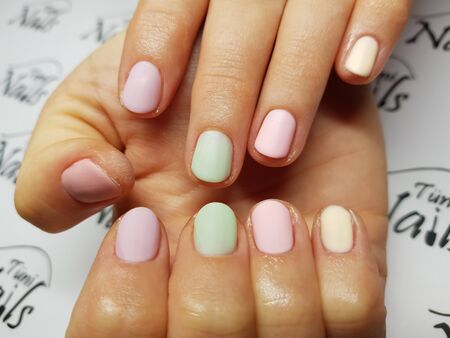 Beautiful colorful nails and hand manicure.のeditorial素材