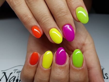 Beautiful colorful nails and hand manicure.のeditorial素材