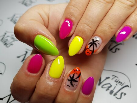 Beautiful colorful nails and hand manicure.のeditorial素材