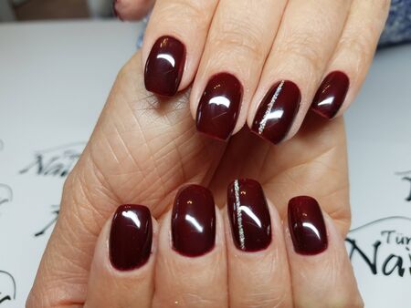 Beautiful colorful nails and hand manicure.のeditorial素材