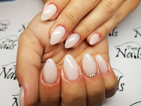 Beautiful colorful nails and hand manicure.のeditorial素材