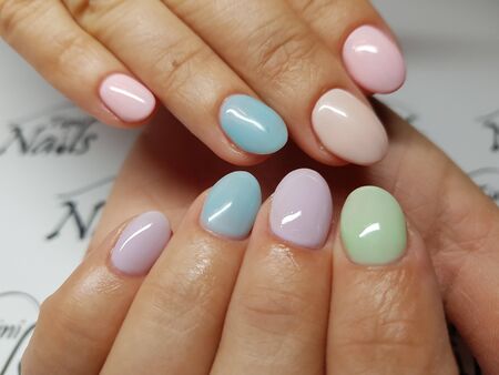 Beautiful colorful nails and hand manicure.のeditorial素材